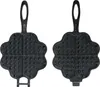 Two black cast iron waffle makers are shown side-by-side against a white background. Produktbild-Vorschau