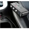 A car's interior, showing a car charger adapter plugged into a cigarette lighter socket. Podgląd zdjęcia produktu
