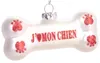 A white bone-shaped Christmas ornament with red paw prints and text. Náhled obrázku produktu