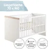 A white crib with wooden accents, shown from a slightly elevated side angle. There are informational graphics at the bottom. Produktbild-Vorschau