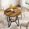 A round dining table with chairs in a dining room setting. Produktbild-Vorschau