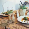 A table setting with food, drinks, and coasters. Produktbild-Vorschau