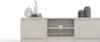 A modern TV stand with decorative items on top, presented against a white background. Náhled obrázku produktu