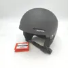 A black Alpina Zupo ski helmet is displayed on a white background. Voir les images du produit