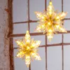 Two star-shaped LED lights hanging in front of a window. Produktbild-Vorschau