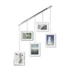 A hanging photo collage with five frames displaying different images. Podgląd zdjęcia produktu