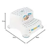 A white two-step stool with Paw Patrol graphics and measurement lines. Produktbild-Vorschau
