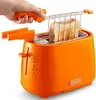 A hand is using a toaster to remove toast. Produktbild-Vorschau