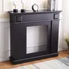 A black fireplace surround is shown in a room with white wainscoting and a patterned rug. Anteprima dell’immagine prodotto