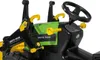 Close-up of the steering wheel and front loader of a toy tractor. Anteprima dell’immagine prodotto