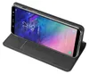 A black flip case with a Samsung Galaxy A6 Plus phone inside, shown at an angle. Produktbild-Vorschau