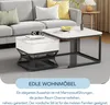 A living room scene with a sofa and two coffee tables. Voir les images du produit