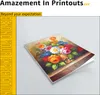 A greeting card with a floral painting is displayed on a light gray surface. Produktbild-Vorschau