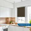 A modern kitchen with white cabinets, a wooden backsplash, and a window with a brown roller blind. Produktbild-Vorschau