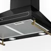 A close-up view of the underside of a black kitchen range hood with gold accents and built-in lights. Podgląd zdjęcia produktu