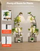 A display of plant stands with plants on them, showcasing their features. Podgląd zdjęcia produktu