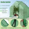 A green greenhouse with plants inside, shown outdoors with a grassy landscape in the background. Close-up shots of the greenhouse features are also included. Podgląd zdjęcia produktu