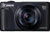 A front view of a black Canon PowerShot SX740 HS digital camera. Podgląd zdjęcia produktu