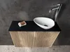 A bathroom vanity with a sink and faucet. Produktbild-Vorschau