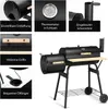 A collage of images showing different features of a black charcoal grill, with a main image of the grill itself. Produktbild-Vorschau