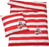 A red and white striped duvet cover and pillowcase set with the 1. FC Köln logo. Produktbild-Vorschau