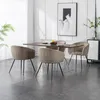 A dining room setting with a table and chairs, artwork on the wall, and a cabinet. Produktbild-Vorschau