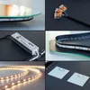 A collage of images showing components and assembly of an LED illuminated mirror. Produktbild-Vorschau