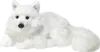 A plush toy arctic fox lying down on a white background. Produktbild-Vorschau
