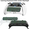A collage of three gaming keyboards with green backlighting, designed to attach to game controllers. Produktbild-Vorschau
