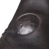 A close-up of a brown leather motorcycle boot with a circular embossed logo. Podgląd zdjęcia produktu