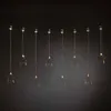 KONSTSMIDE Tenda luminosa a LED, 8 stelle in plastica, 8 Anteprima dell’immagine prodotto 2