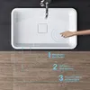 A top-down view of a white rectangular sink with a faucet, a hand touching the sink surface, and numbered callouts highlighting features. Anteprima dell’immagine prodotto