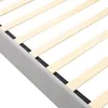 A close-up view of a bed frame with wooden slats. Produktbild-Vorschau
