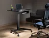 A modern office setup with a height-adjustable laptop desk and an ergonomic chair. Produktbild-Vorschau