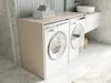 A modern bathroom with a washing machine and dryer cabinet. Voir les images du produit