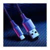 A close-up shot of a UGREEN USB-A to USB-C cable against a dark, ribbed background. Produktbild-Vorschau