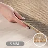 A hand is shown lifting the edge of a rug to demonstrate its thickness, with a close-up inset showing the rug's fibers and a measurement indicator. Náhľad obrázku produktu