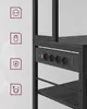 A close-up of a black shelving unit with an integrated power strip. Náhled obrázku produktu