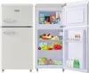 A retro-style refrigerator with its door open, showcasing its contents. Produktbild-Vorschau