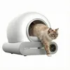 A cat is exiting an automatic self-cleaning litter box. Podgląd zdjęcia produktu
