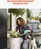 A woman is planting in a large planter pot on a patio, with a dog sitting next to her. Voir les images du produit