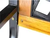 Close-up view of the joinery between a black metal frame and a wooden part of a garden bench, showing screws. Anteprima dell’immagine prodotto