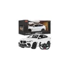 A white Rastar BMW X6 M RC car is shown, with its packaging box above it. Podgląd zdjęcia produktu