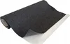 A roll of dark gray felt fabric with a white backing is shown diagonally against a white background. Produktbild-Vorschau