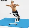 A man is using a fitness machine on a blue mat. Produktbild-Vorschau