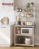 A kitchen shelving unit with various kitchen appliances and containers on it. Náhled obrázku produktu