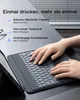 Hands typing on a keyboard attached to a tablet. Produktbild-Vorschau