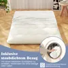 A mattress is shown on a wooden floor, with a washing machine inset in the lower right corner. Produktbild-Vorschau