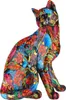 A colorful, intricately decorated cat figurine. Produktbild-Vorschau