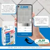 A hand holding a smartphone displaying a tile grout color selection app, next to a bag of MAPEI Ultracolor Plus grout. Produktbild-Vorschau